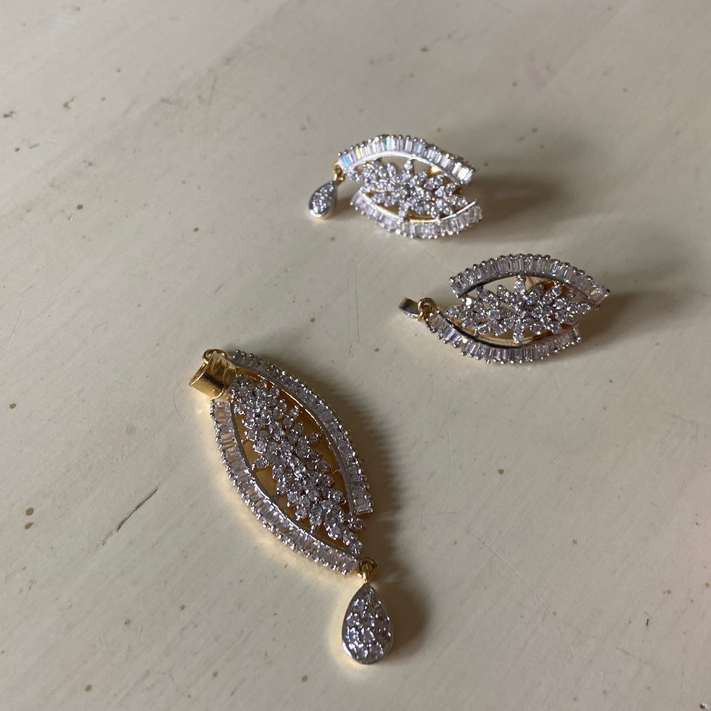 crystal earring with gold tone setting